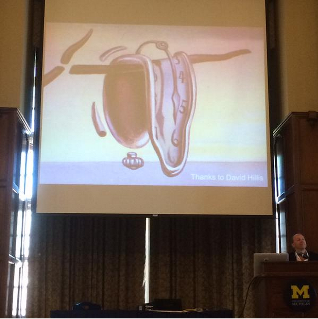 Tweet from David Hillis: "Molecular clocks can be useful but we need to take sources of error seriously (like Dali clock) #SSB2015"